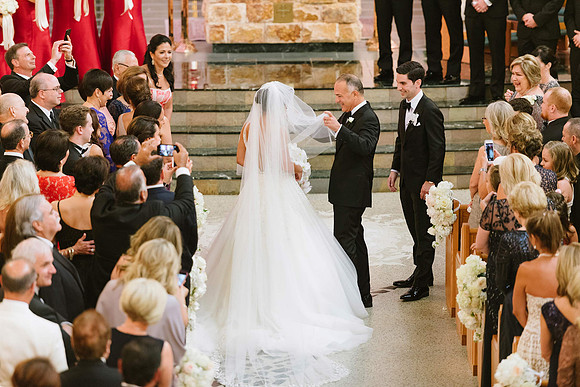 dad-pulling-back-brides-veil